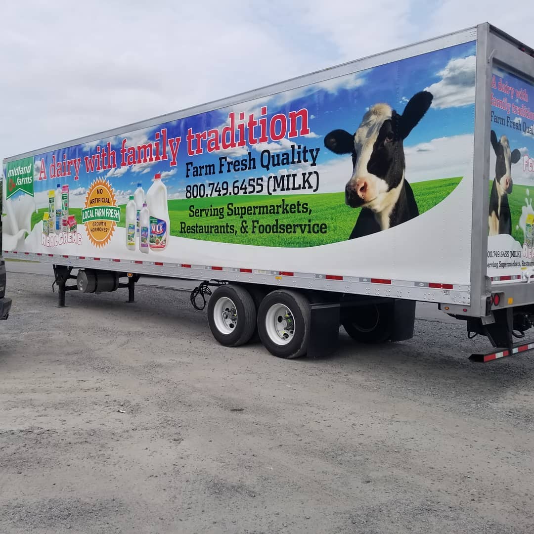 Vinyl wrap installed on tractor trailer. Full service wrap shop prints and installs vinyl vehicle wraps.
