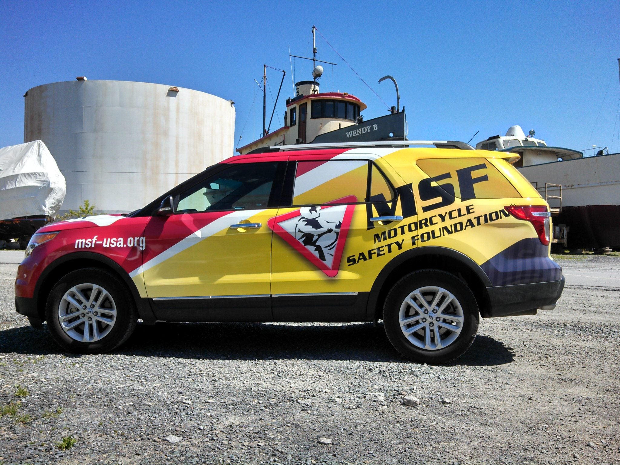 Amazing vinyl wrap installed on SUV. Full wrap printed and laminated with cast vinyl materials, and perforated view-thru window vinyl.