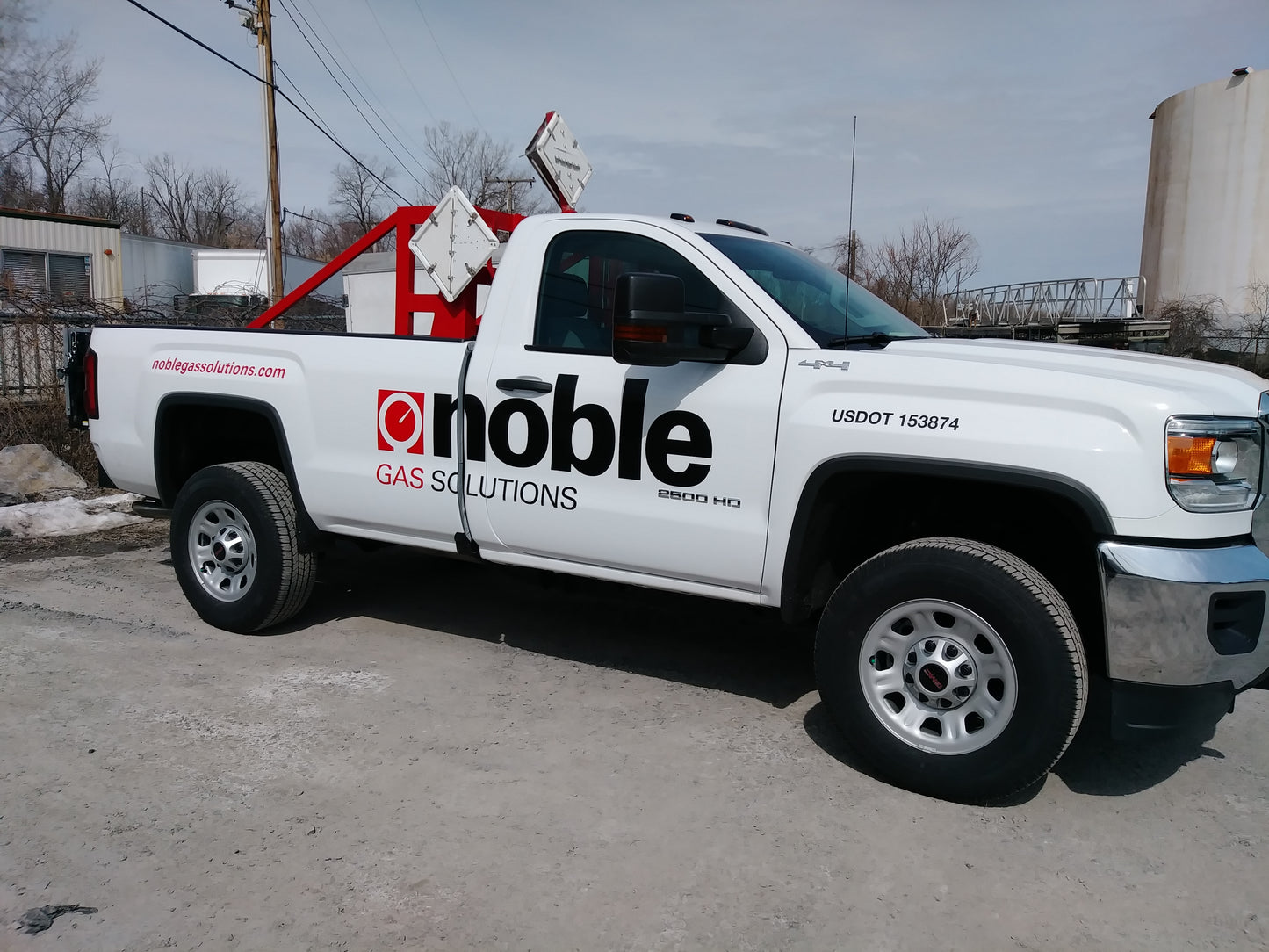 High quality, long lasting vinyl lettering installed on pickup truck. Cast vinyl logo, website and USDOT number decals shown.