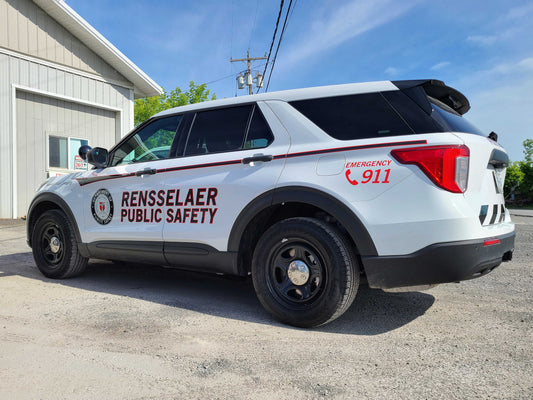 Security patrol car graphics installed by All Signs & Graphics Inc on this SUV.  Red and black reflective striping and reflective lettering and seal printed on premium cast vinyl materials and overlamianted with cast laminate for added protection and durabillity.