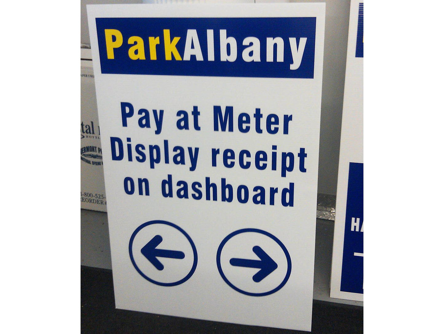 Corrugated plastic parking signs.  Coroplast signs work great for sidewalk sign inserts.