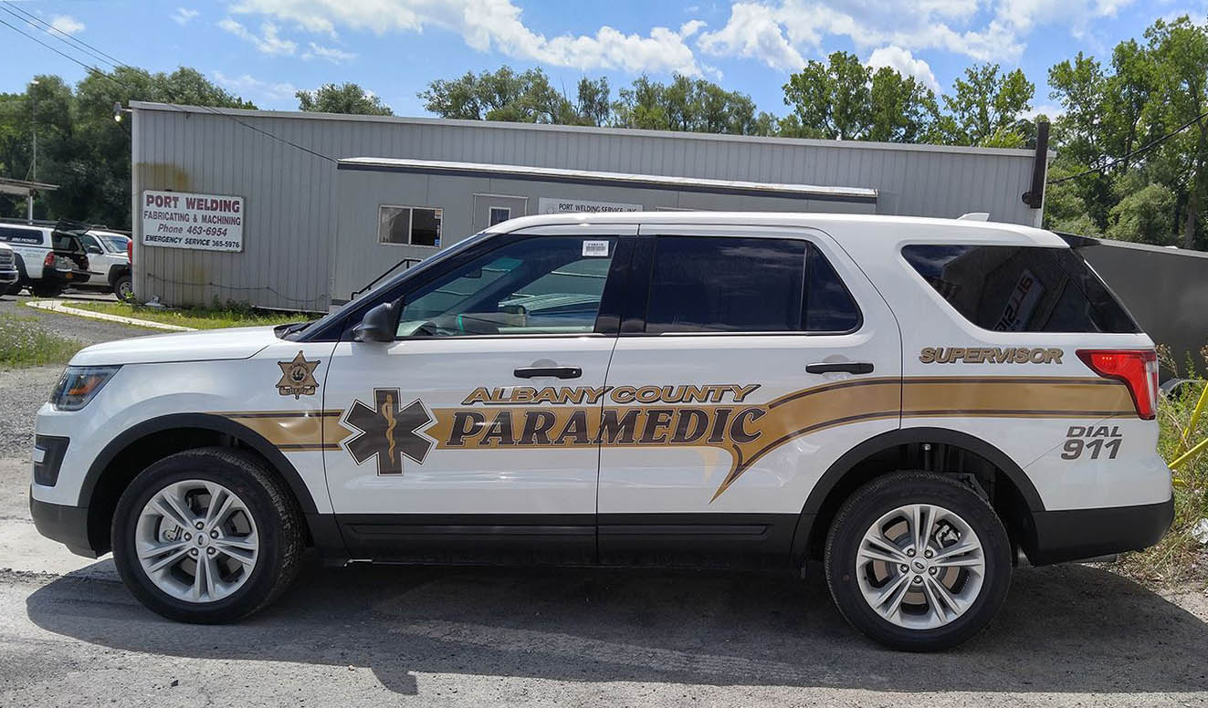 Metallic gold and reflective vinyl graphics installed on paramedic vehicle.  High quality vinyl lettering for emergency vehicles.